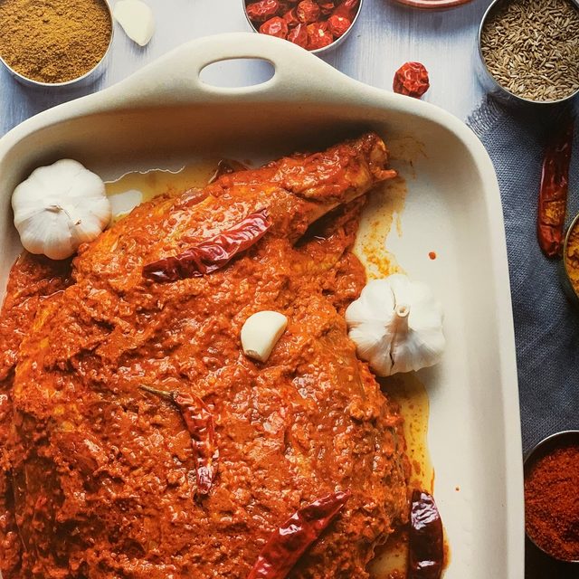 Persian raan, slow-roasted lamb leg in a spiced red marinade